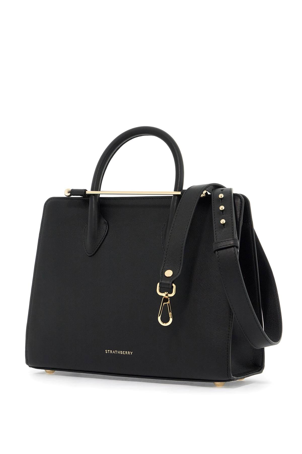 Strathberry Midi Tote in black leather showcasing the signature bar closure