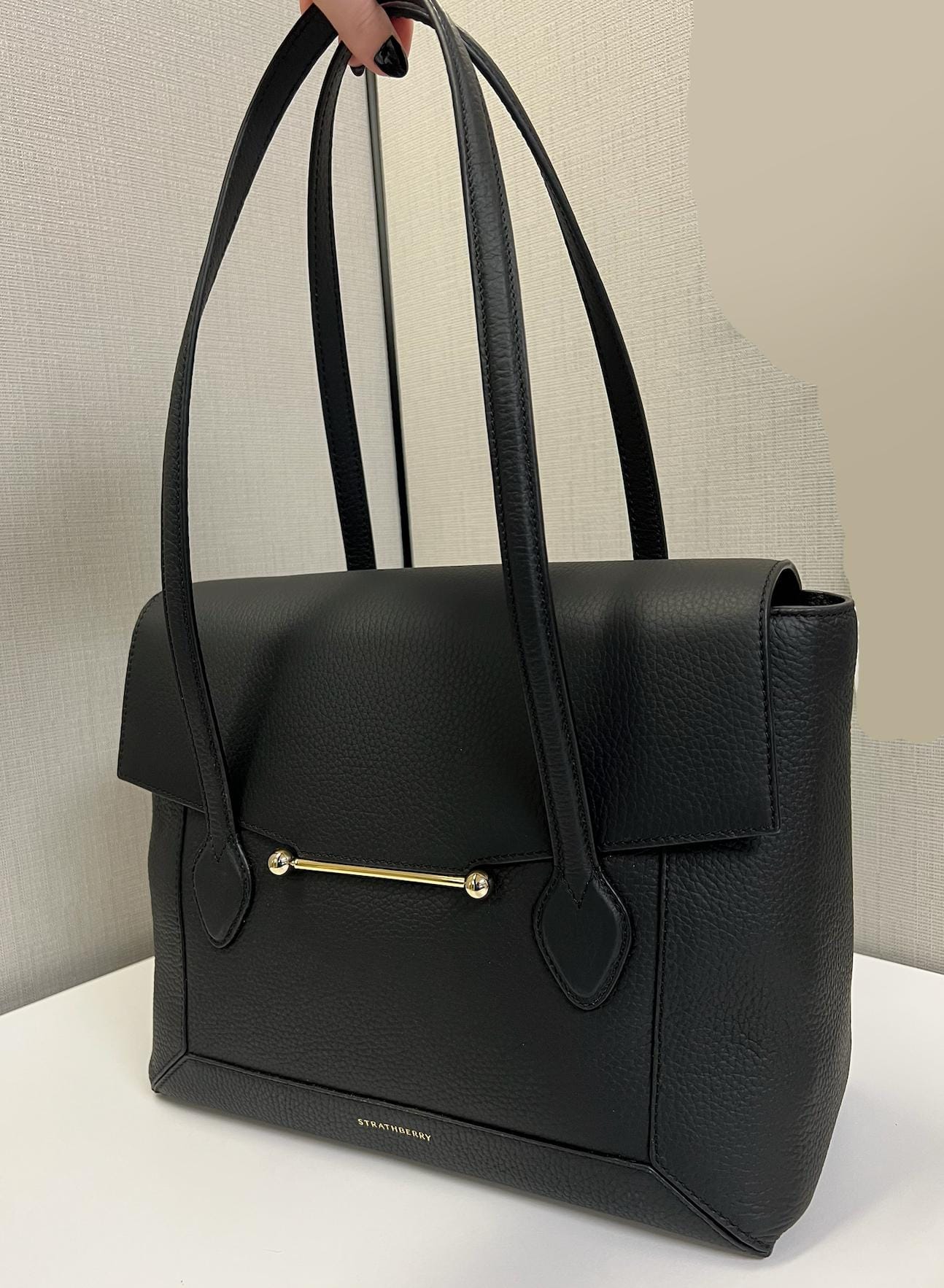 Strathberry Mosaic Tote in black leather — a balanced modern luxury option