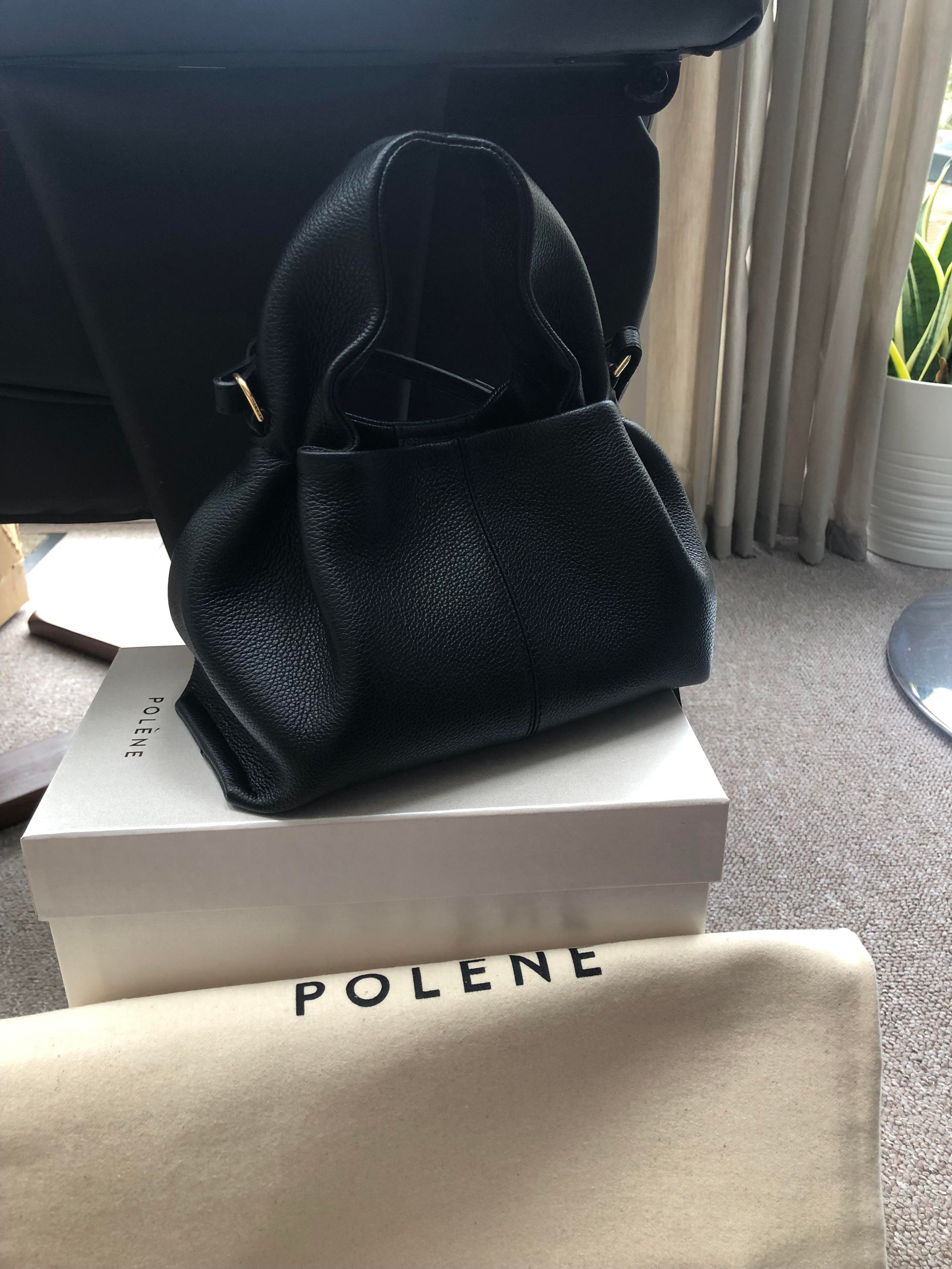 Polène Neuf Mini handbag in black leather — an excellent design-for-dollar value option