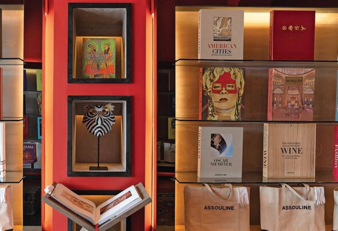 Assouline boutique store showcasing luxury coffee table books on elegant display shelves