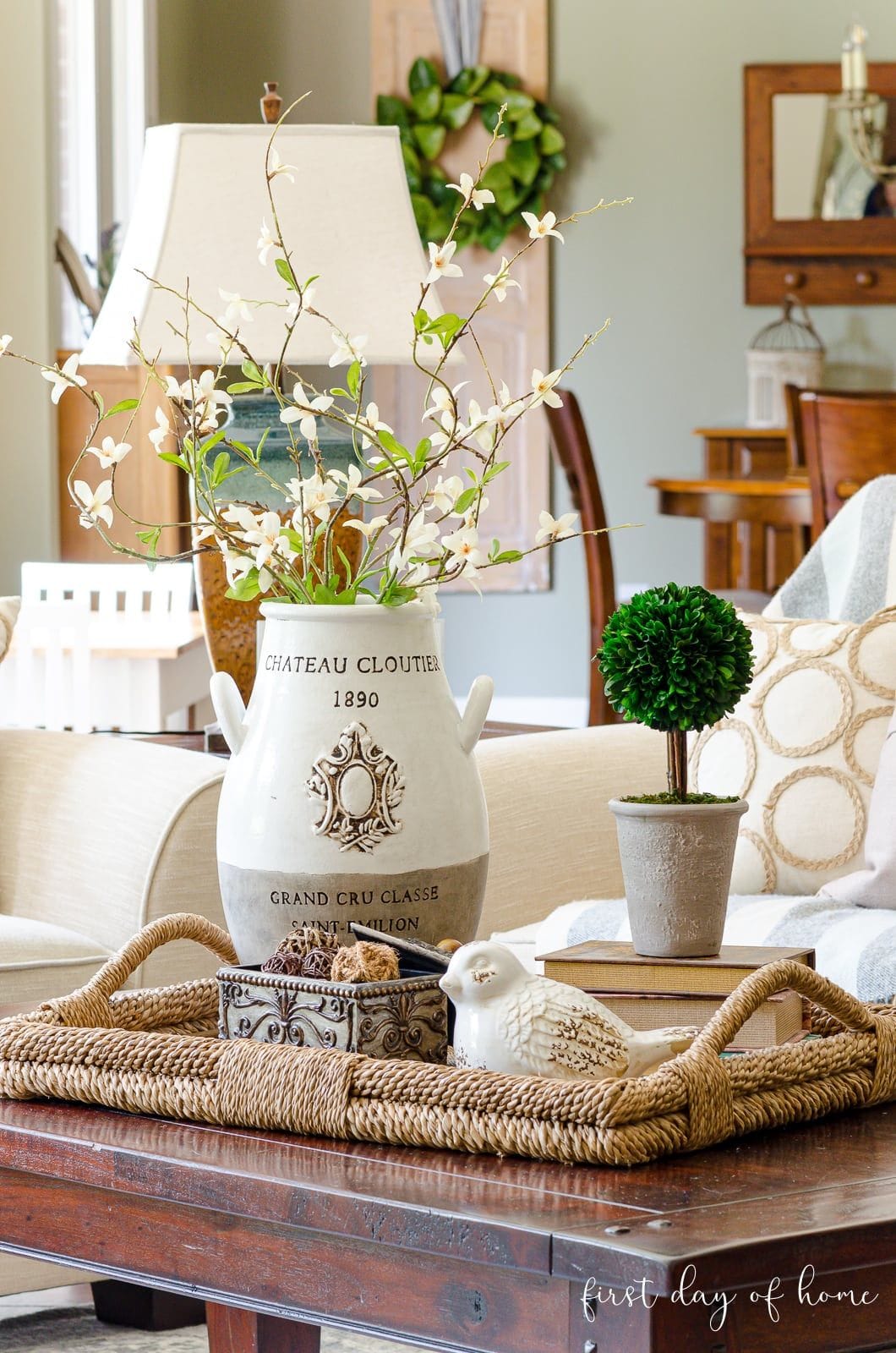 Elegant coffee table decor with stacked design books creating a curated home vignette