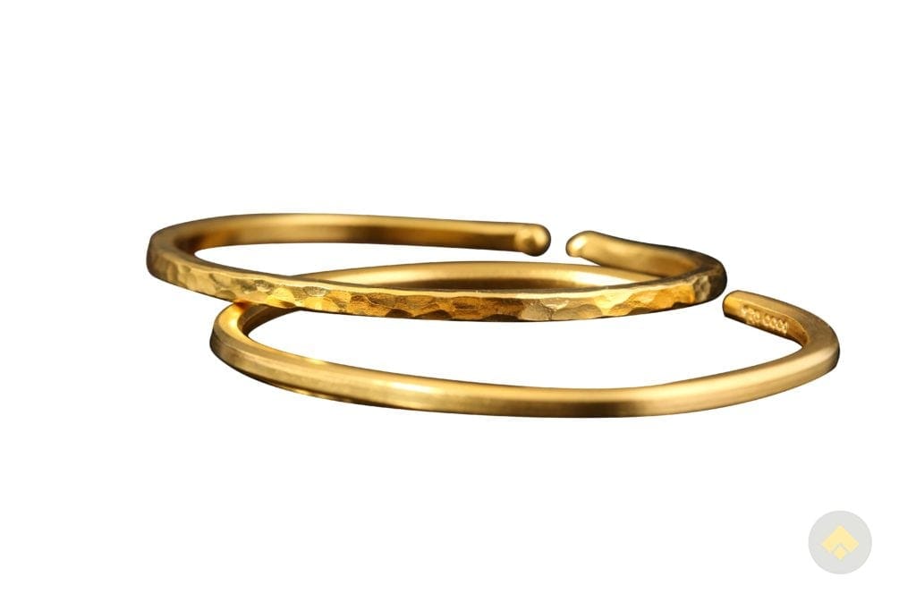 24 karat gold bracelet with hammered finish showcasing pure gold jewelry