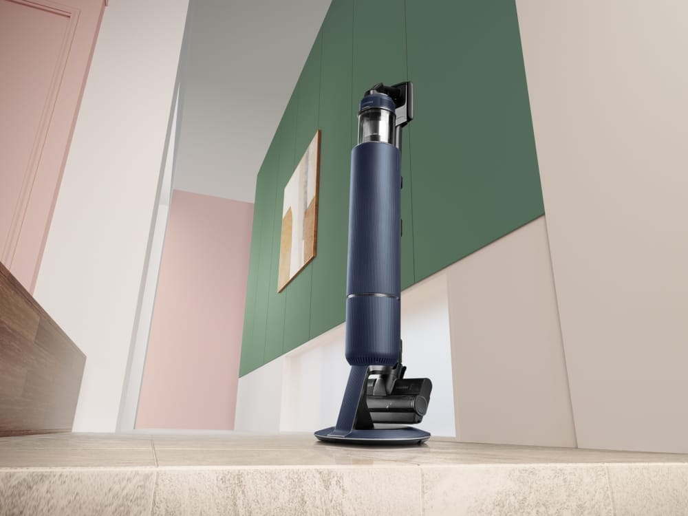 Samsung Bespoke Jet cordless vacuum with All-in-One Clean Station showing the self-emptying feature