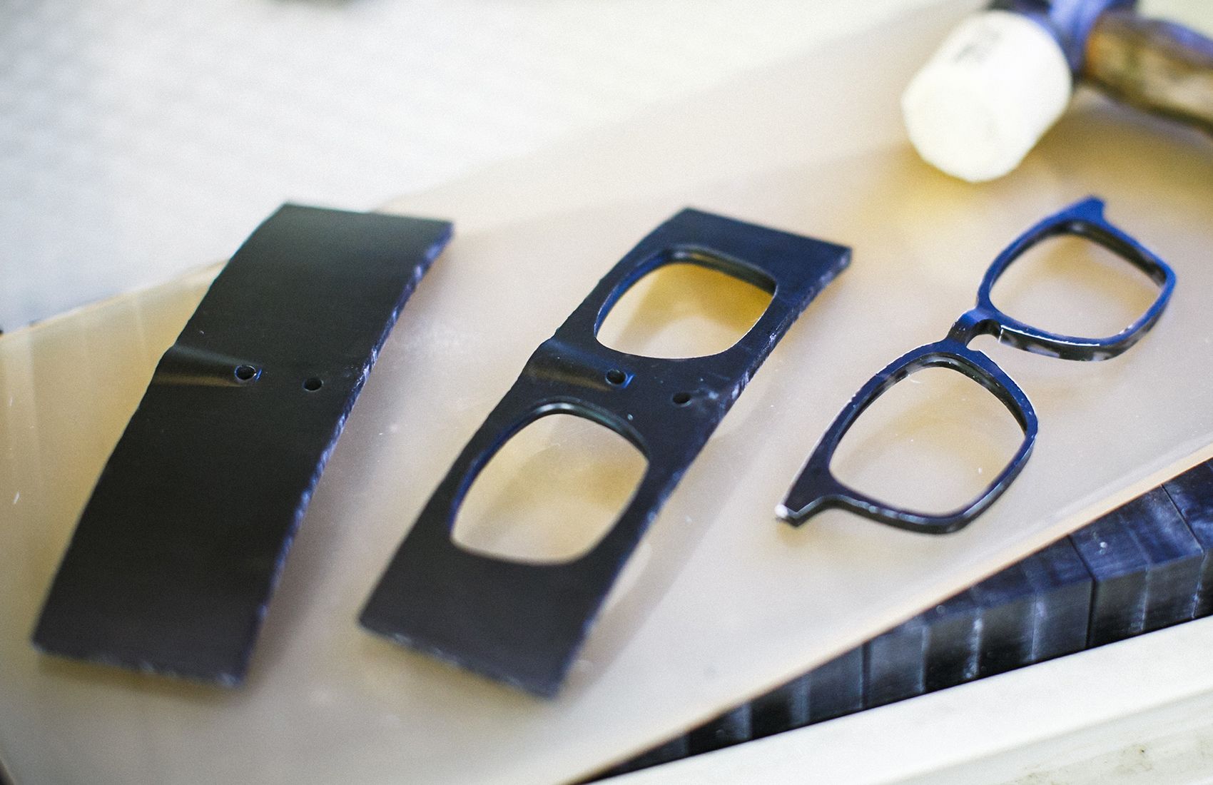 Handmade acetate eyeglass frames showing premium craftsmanship and color depth