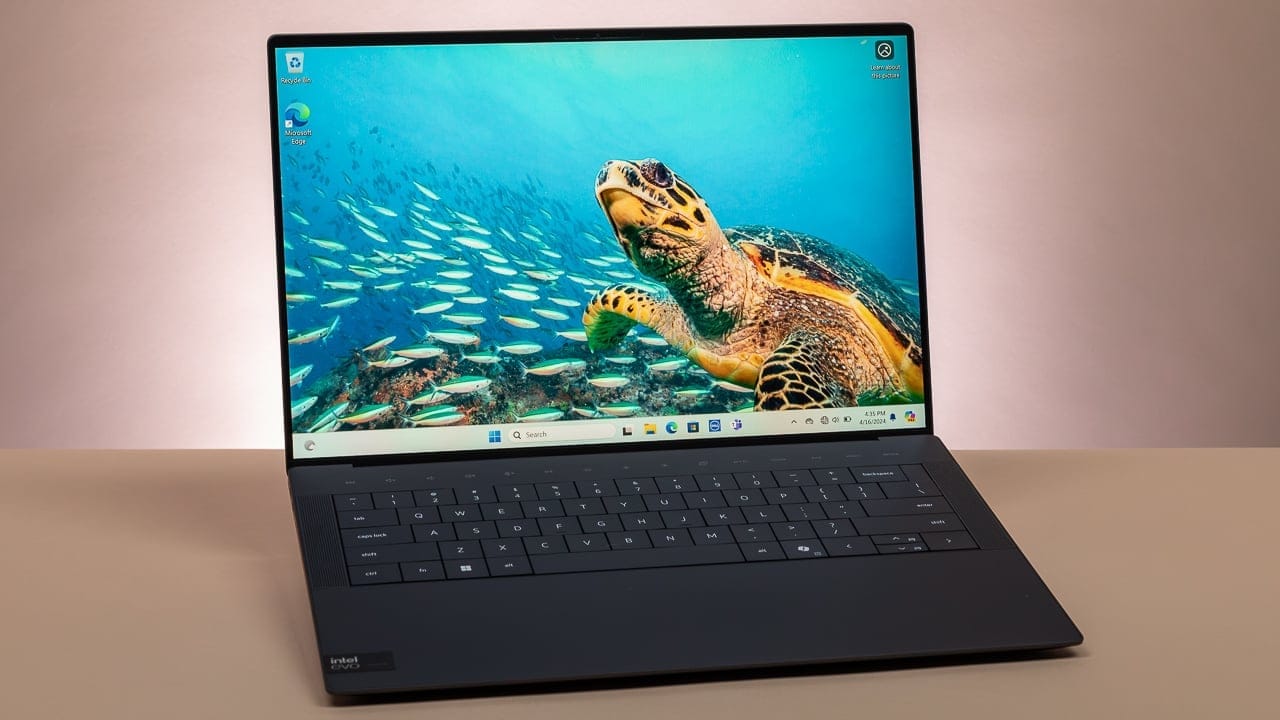 Dell XPS 14 9440 laptop showcasing its minimalist aluminum design and OLED display