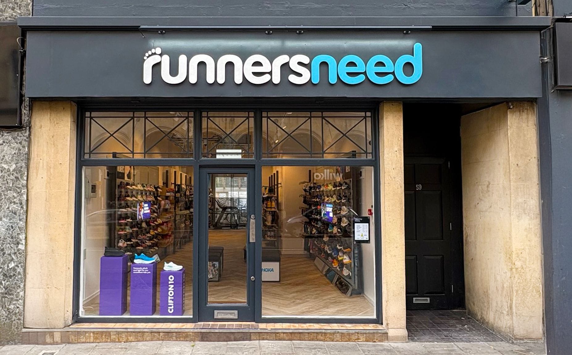 Runners Need store front in Bristol Clifton showing running shoe retail display-couponsscout.com