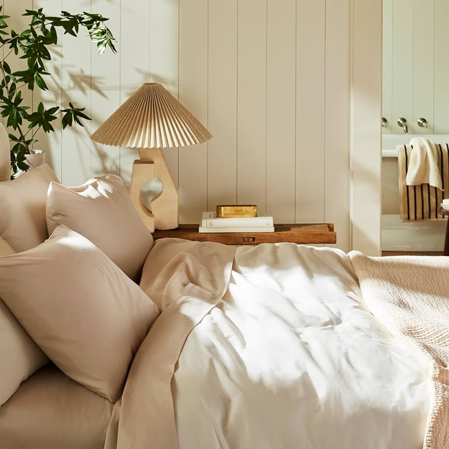 Brooklinen Luxury Sateen bedding set in white showing premium quality sheets