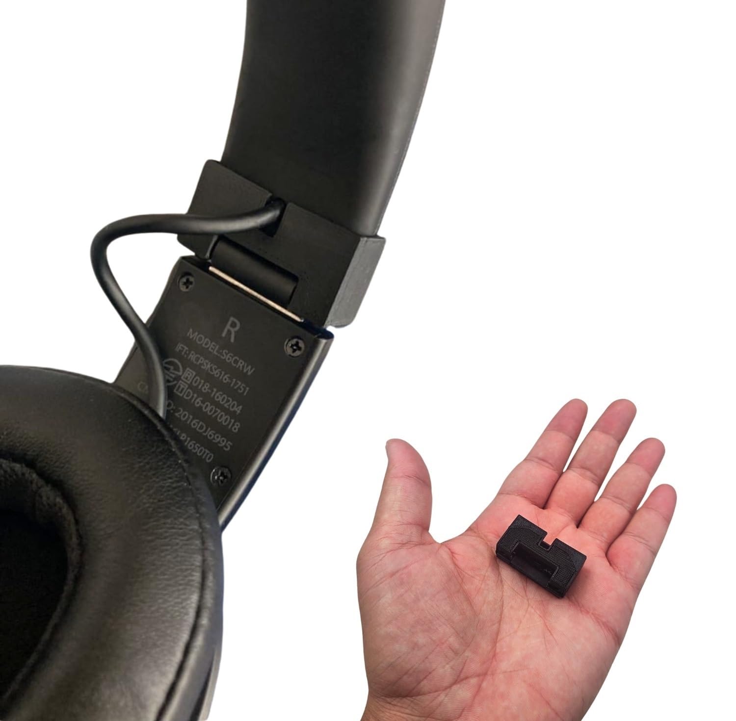 Replacement hinges for Skullcandy Crusher headphones showing the fragile plastic design that commonly breaks