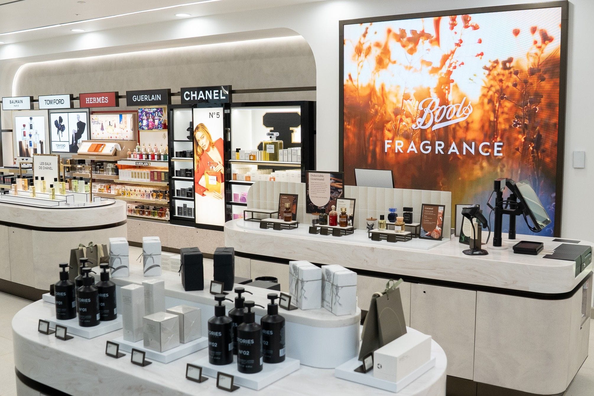 Boots UK standalone fragrance boutique store interior with premium perfume display