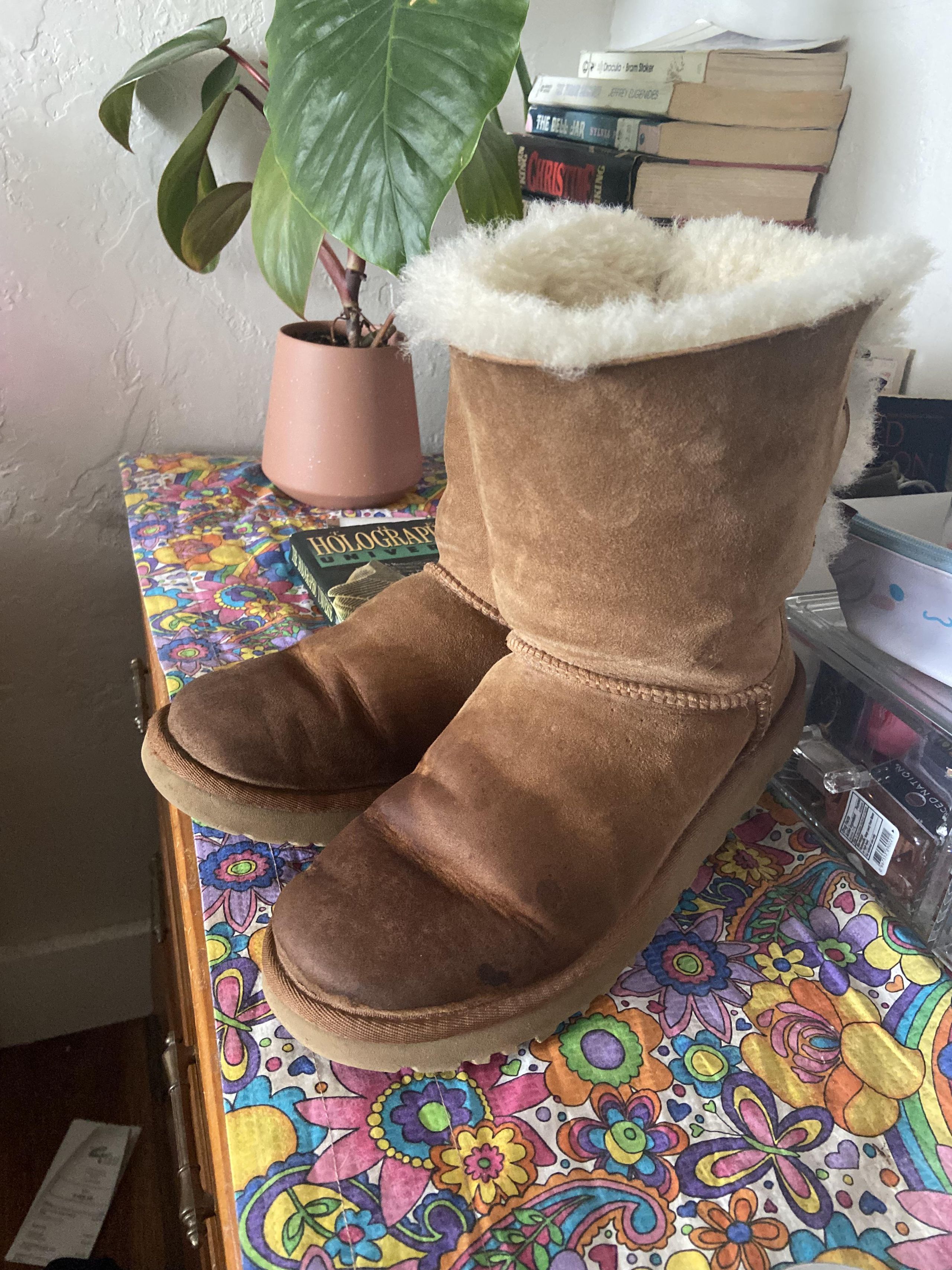 Water-stained UGG boots showing permanent damage from moisture exposure