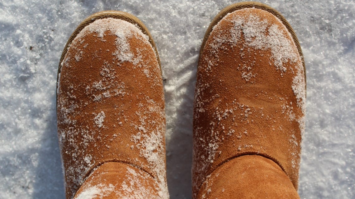 UGG boots in snowy winter conditions showing weather vulnerability
