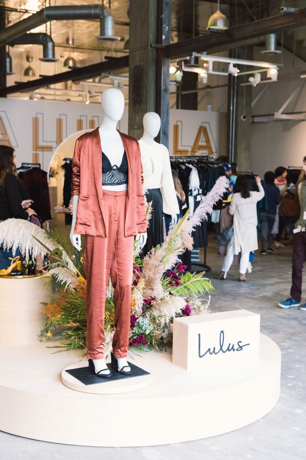Lulus Pop Up Shop showcasing trendy women's fashion and event dresses