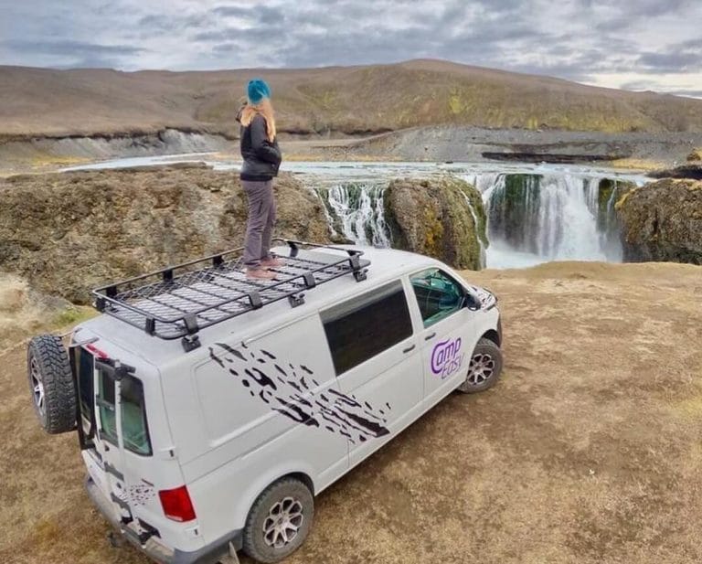 CampEasy modern campervan interior fleet showcasing comfortable bed and kitchen equipment