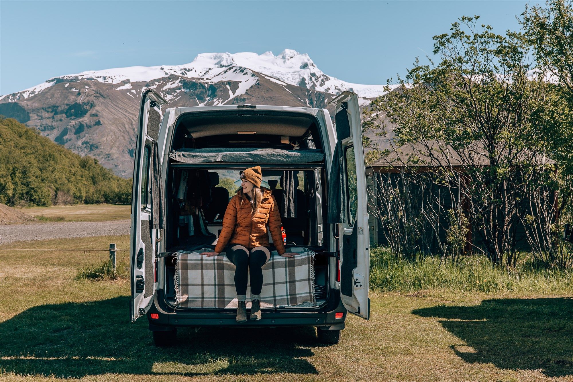 Kuku Campers Iceland affordable budget campervan rental fleet with colorful painted vans