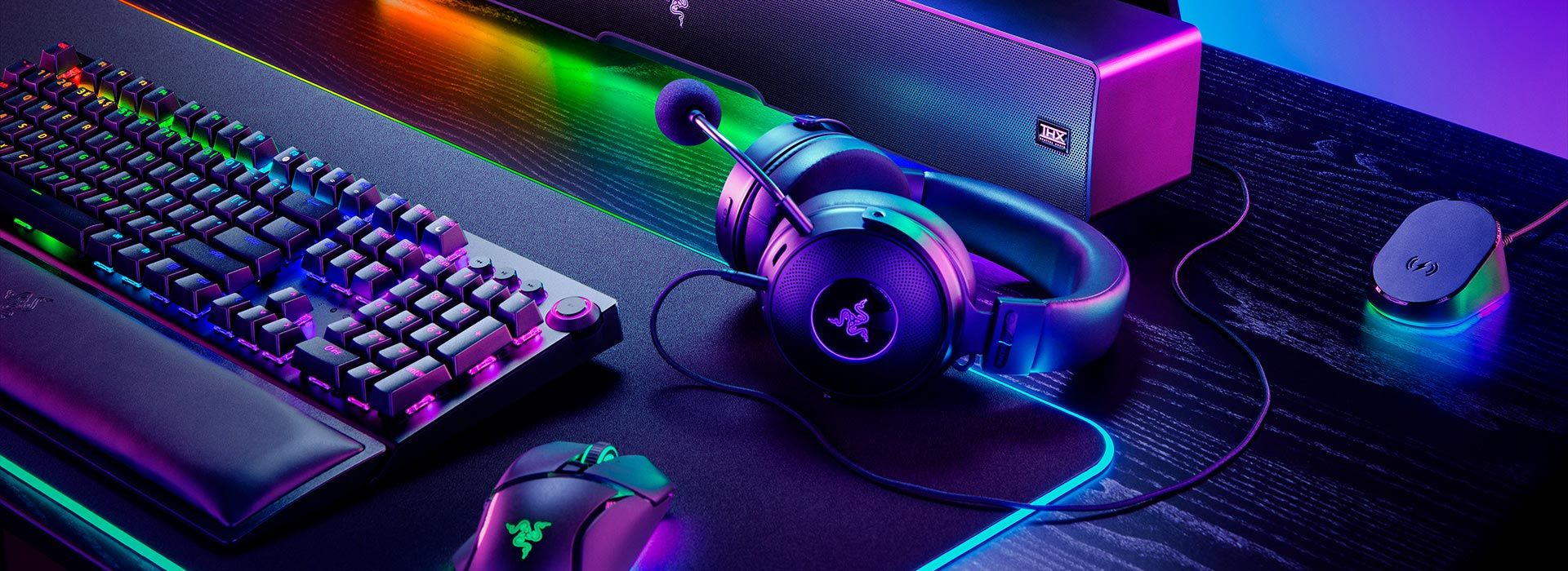 Razer Chroma RGB lighting ecosystem displayed across keyboard, mouse, and gaming peripherals setup