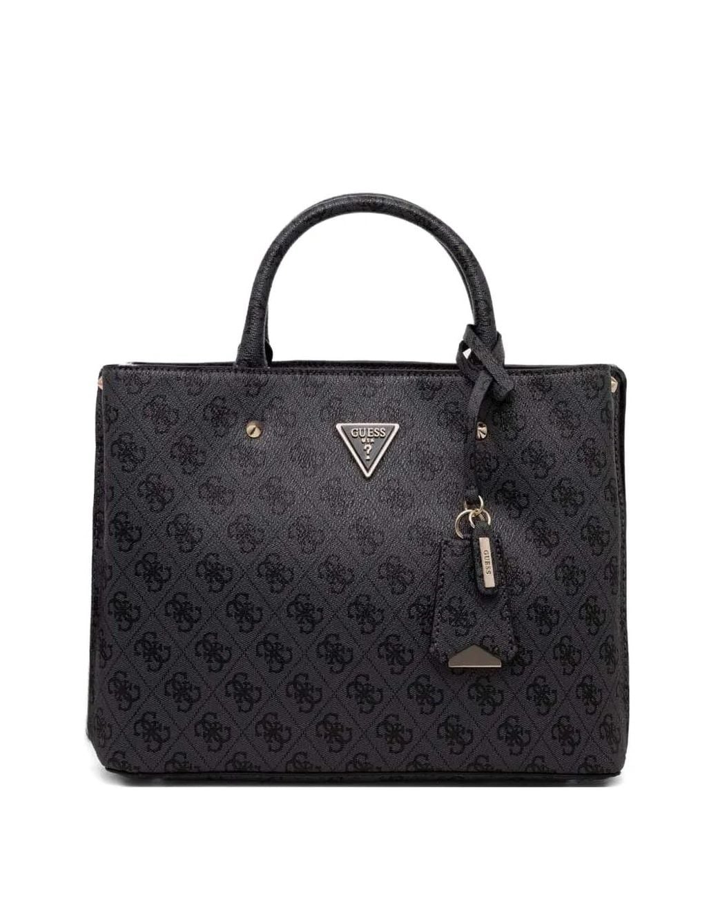 GUESS triangle-logo tote bag in black showcasing the brand's signature bold aesthetic