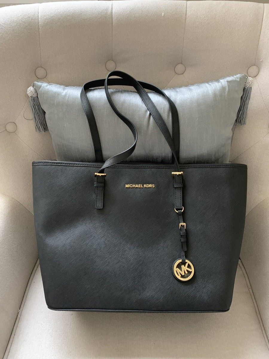 Michael Kors Jet Set tote in black Saffiano leather showing premium hardware and finish