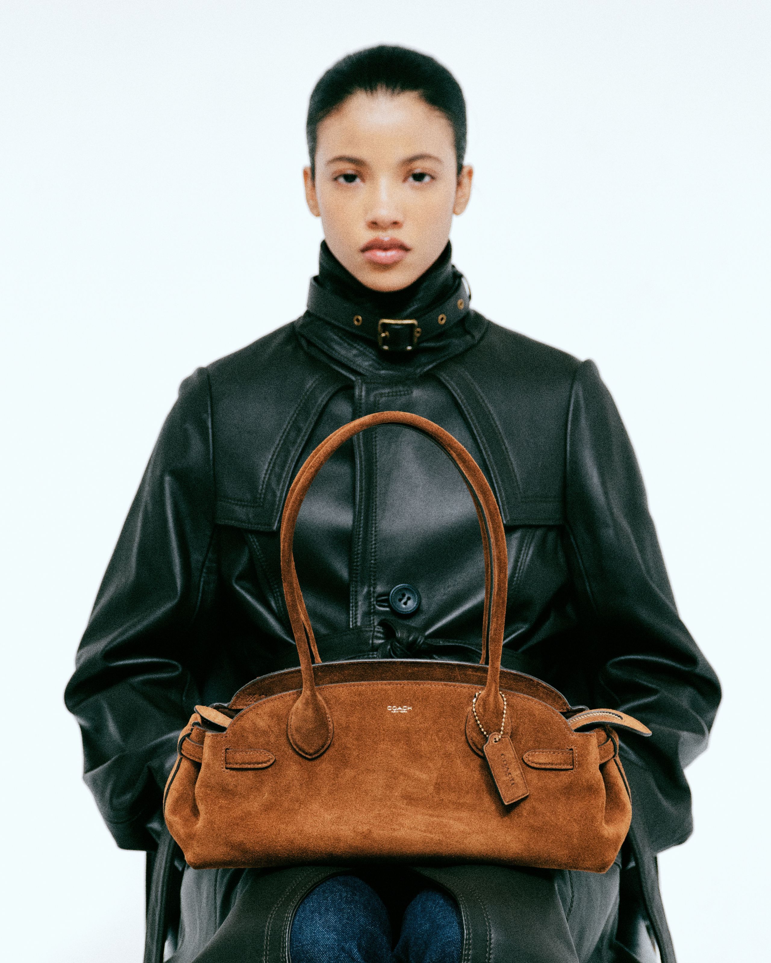 Coach genuine leather classic handbag representing the smartest long-term luxury investment