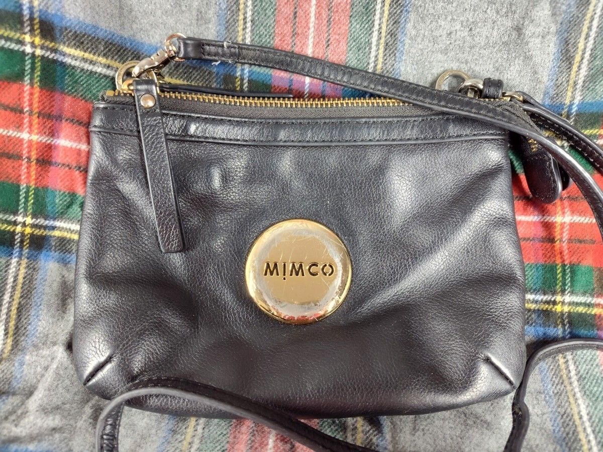Mimco Australia black leather quilted crossbody bag showcasing signature Australian design