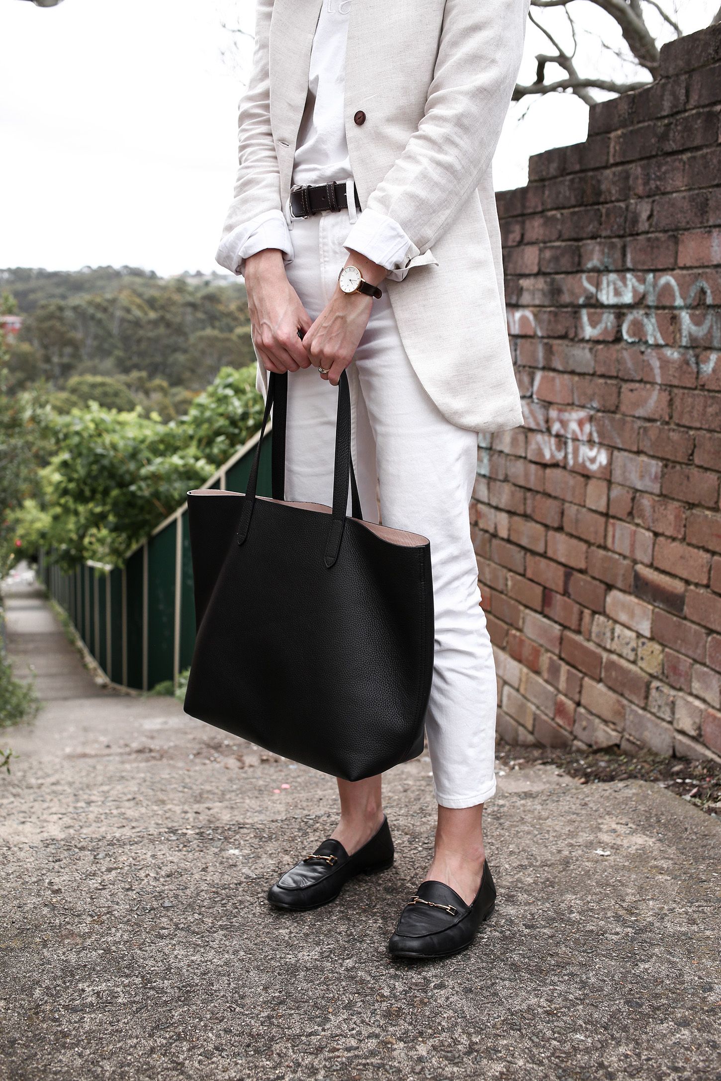 Cuyana Classic Structured Leather Tote in caramel and blush showing premium pebbled leather construction