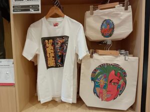 Oxygen Clothing Review (2026): A Tale of Two Brands (Philippines vs. Pakistan) -Uniqlo Philippines flagship store interior featuring quality basic apparel and t-shirt collection display-couponsscout.com
