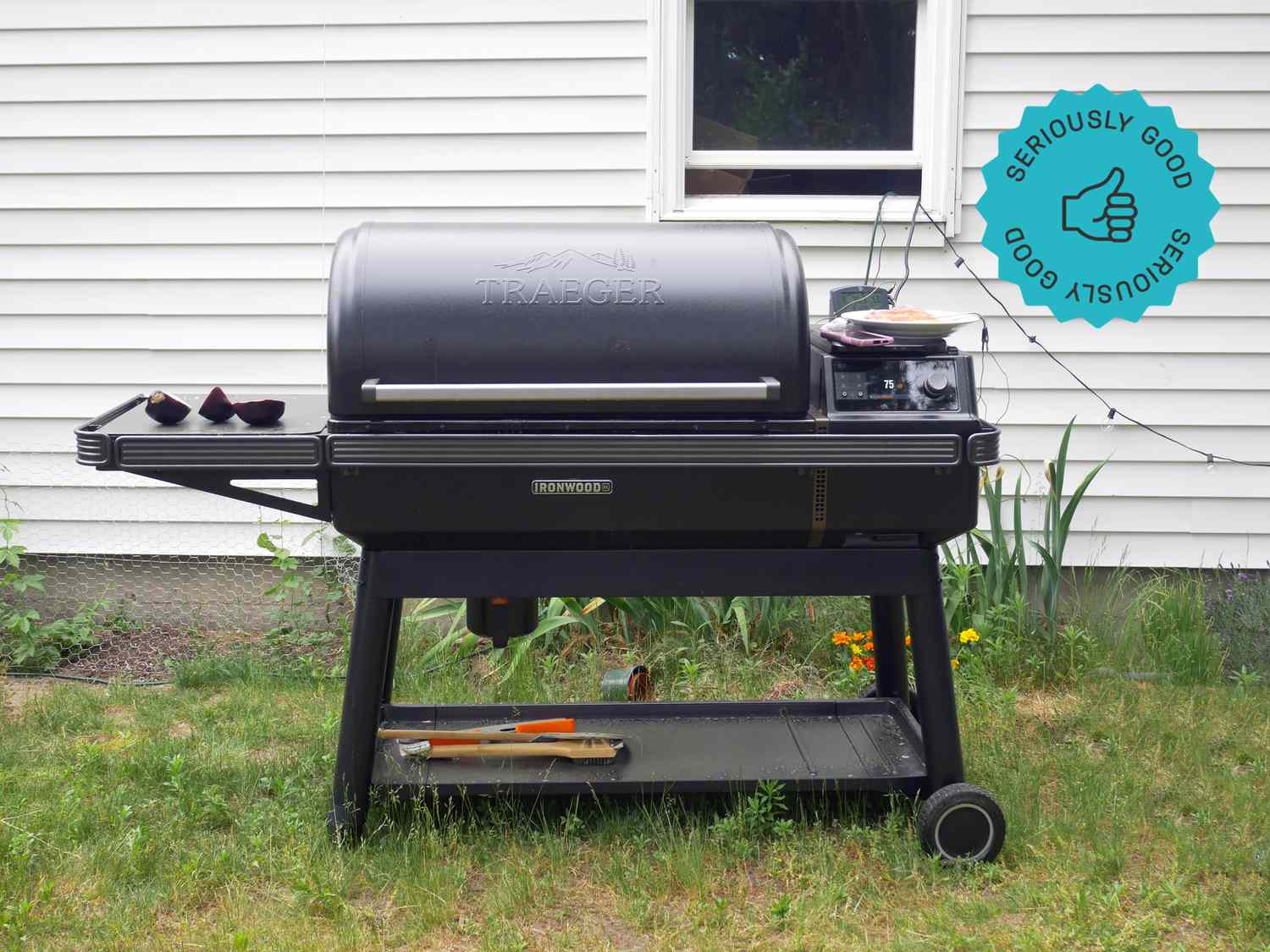 Traeger Ironwood XL pellet grill smoker with WiFIRE technology in outdoor backyard setting