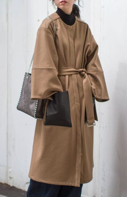 Japanese minimalist linen fashion aesthetic in neutral tones reflecting Komorebi Collection style