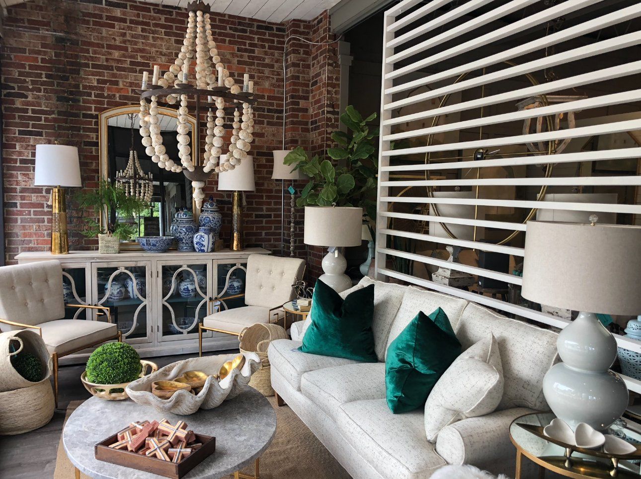 The Nested Fig home decor store curated farmhouse style interior display with vintage furniture and accessories