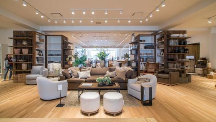 Pottery Barn retail store showroom featuring classic transitional furniture and home decor as a Nested Fig alternative