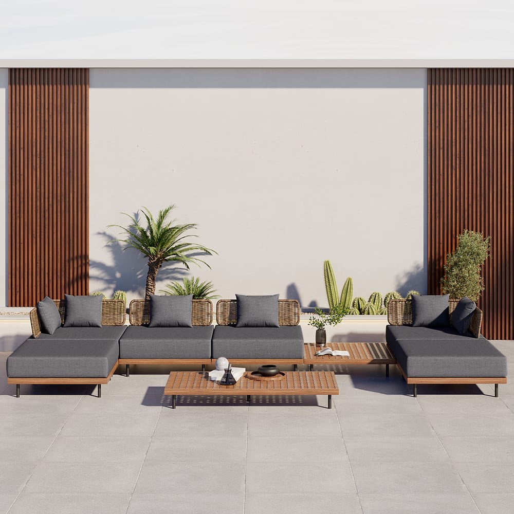 Modern L-shaped outdoor sectional sofa set on patio with gray cushions illustrating Tilly-Living style aesthetic