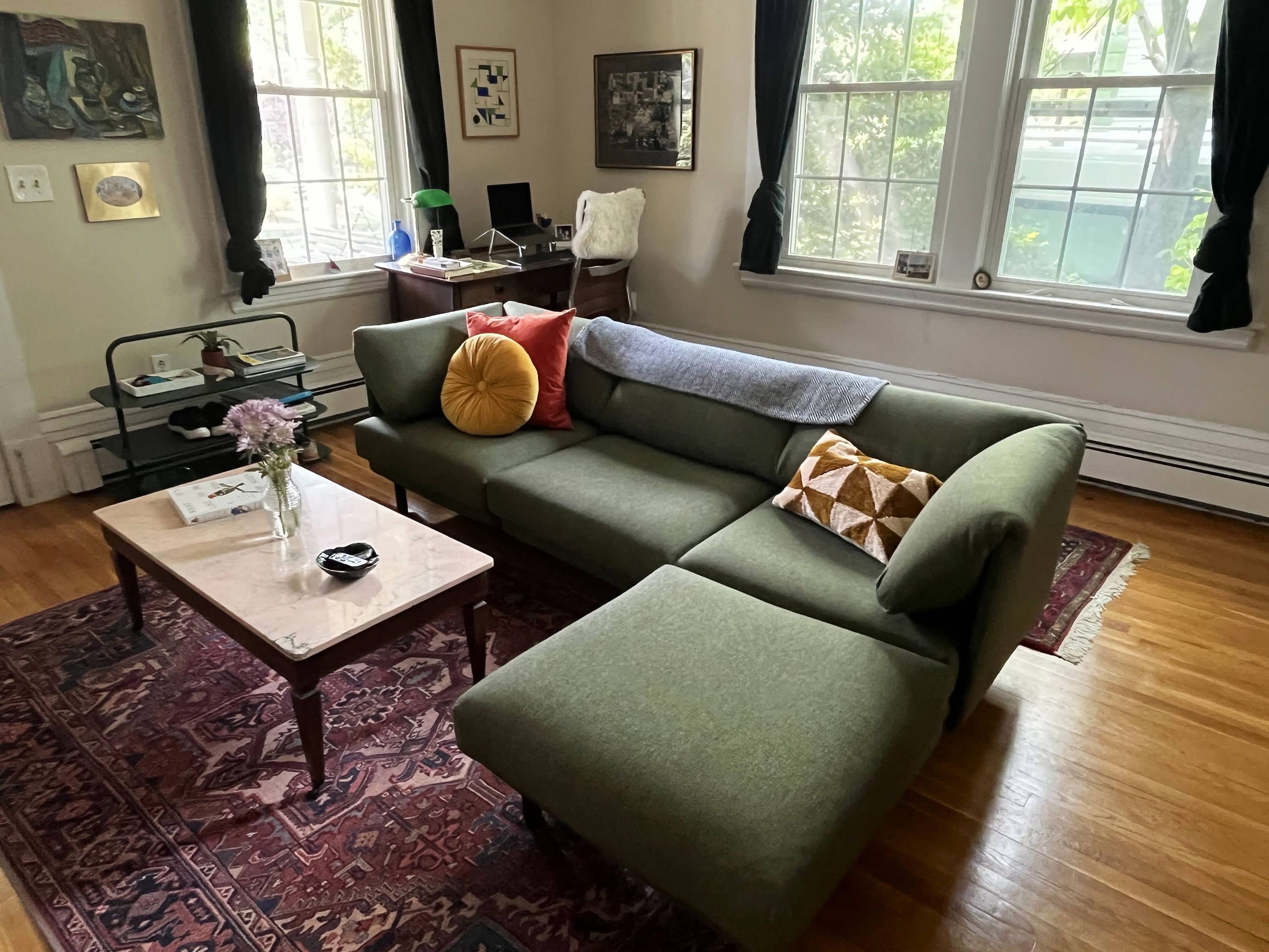 Burrow Range modular sectional sofa shown in a stylish urban apartment living space