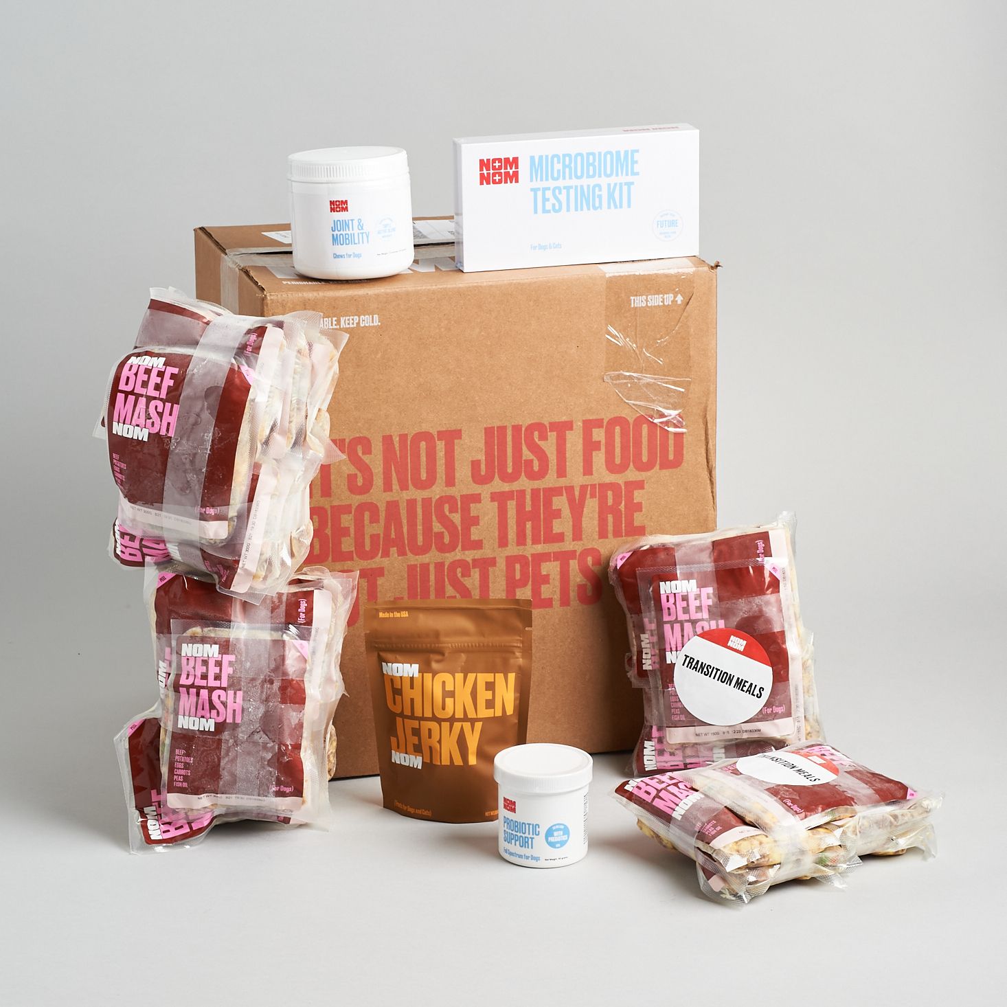 Nom Nom fresh dog food packaging with portioned beef and chicken meal pouches