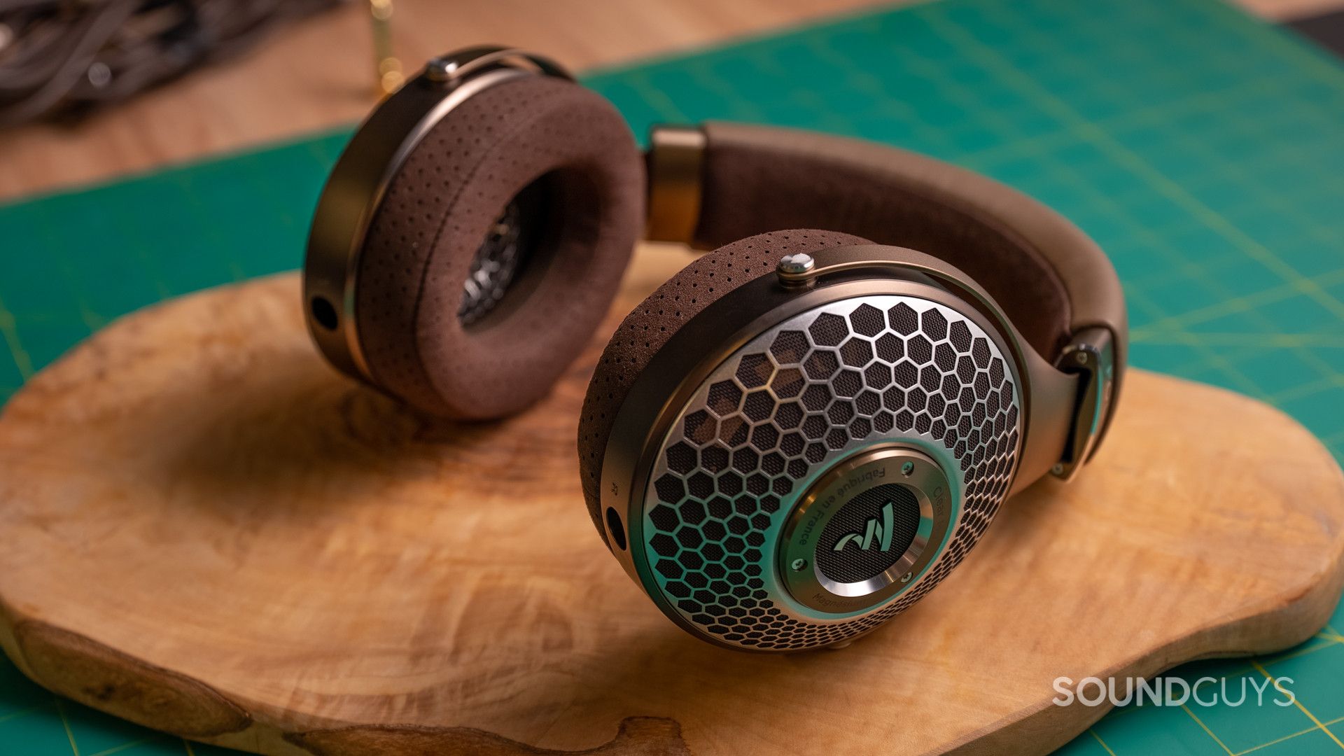 Focal Clear Mg open-back headphones with magnesium driver shown on a dark studio background