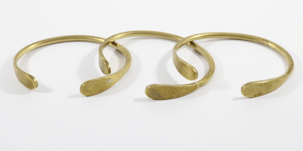 Gold plated brass jewelry tarnishing illustration showing wear on chain links over time