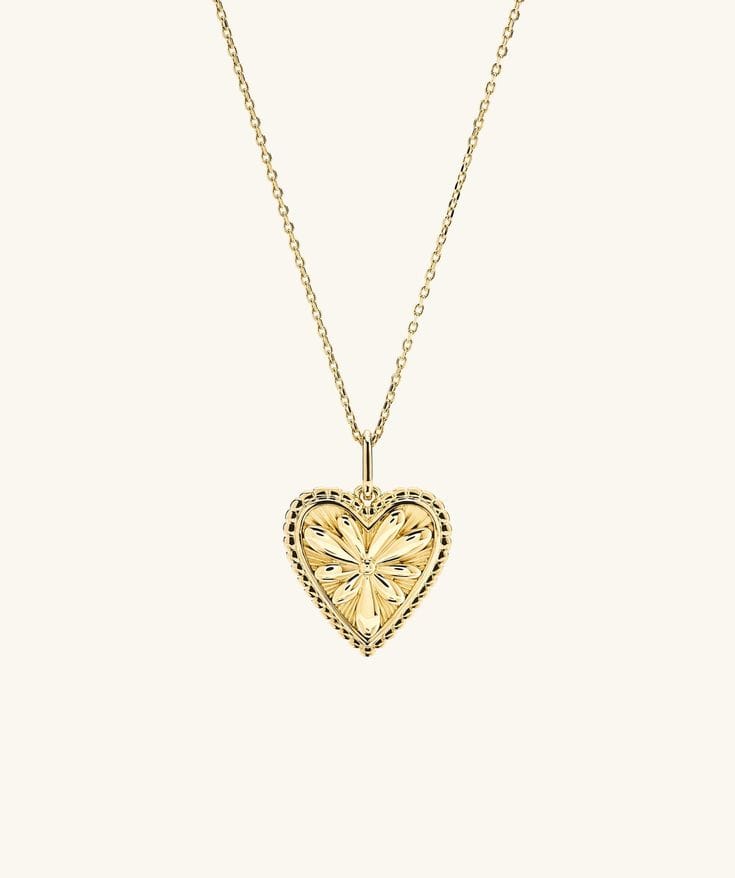 Mejuri 18k gold vermeil calendula pendant necklace on minimal styled background