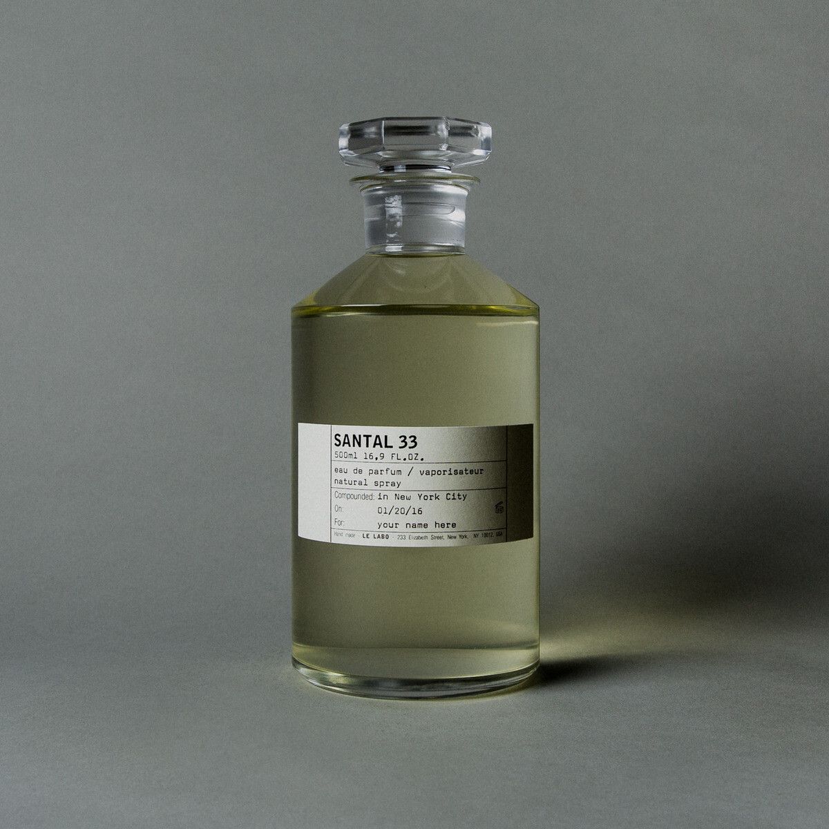 Le Labo Santal 33 Eau de Parfum amber bottle with signature minimalist white label