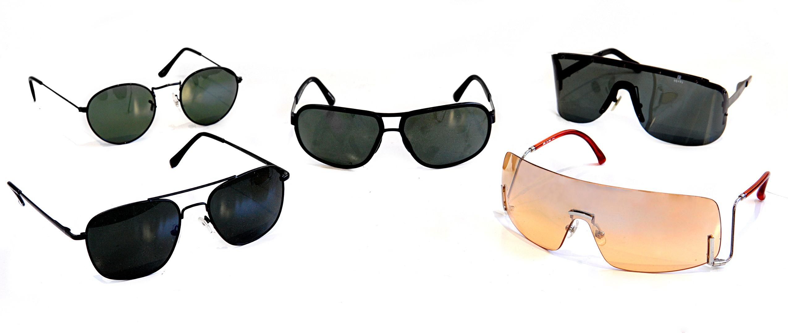 Machine56-style artisan techwear sunglasses showcased in a high-concept cyberpunk fashion editorial