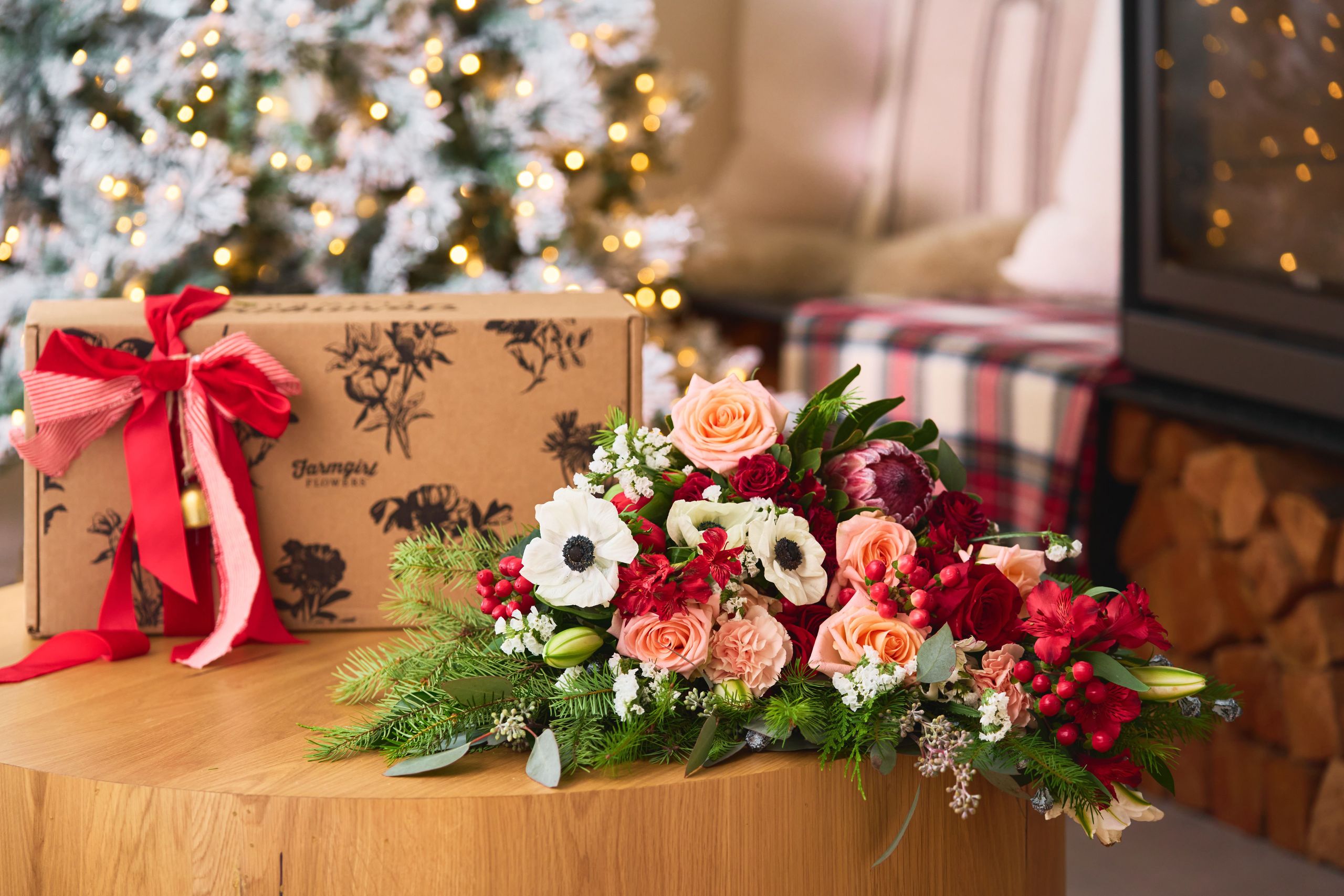 Flower subscription delivery box with fresh seasonal bouquet wrapped for shipping