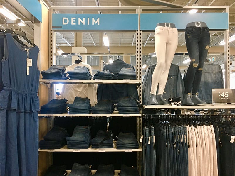 Nordstrom Rack designer discount retail store featuring premium denim brands with customer friendly returns