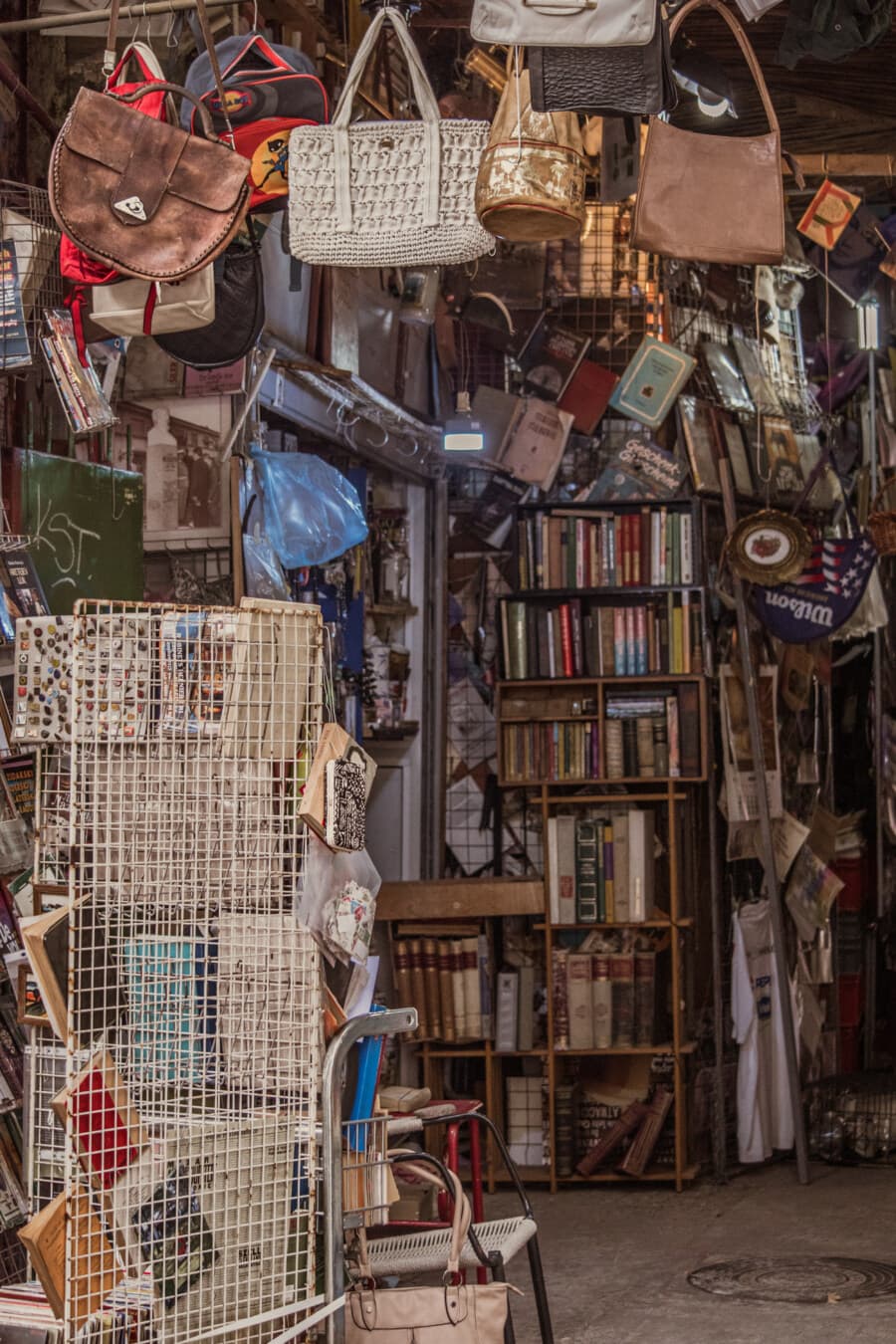 Independent bookstore shelves filled with used books available through online marketplace platforms