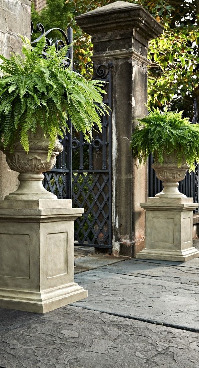 Frontgate Parisian urn planter on plinth showing stone composite outdoor décor styling