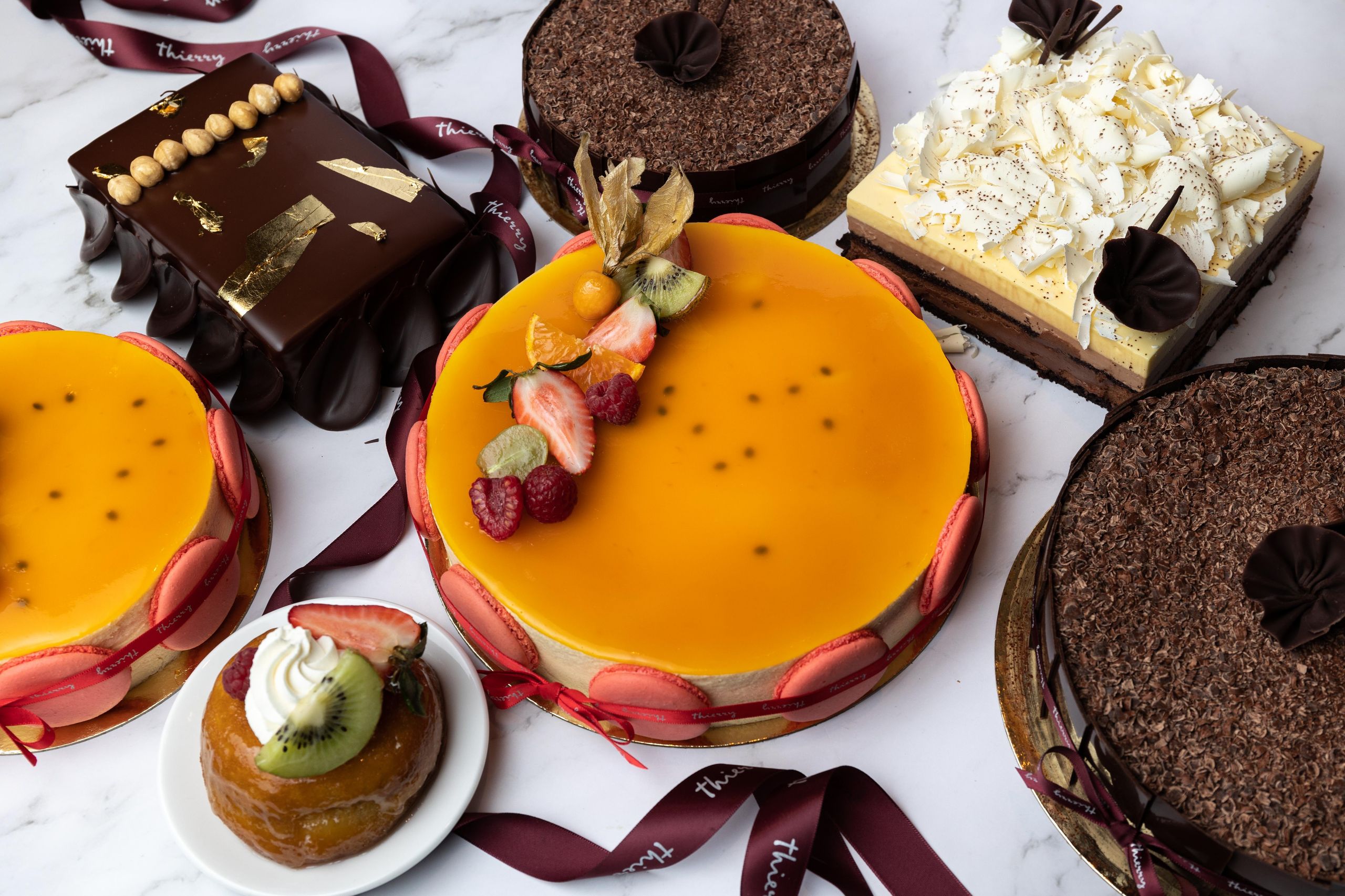Thierry Chocolates Vancouver French patisserie display case showing elegant cakes and tarts