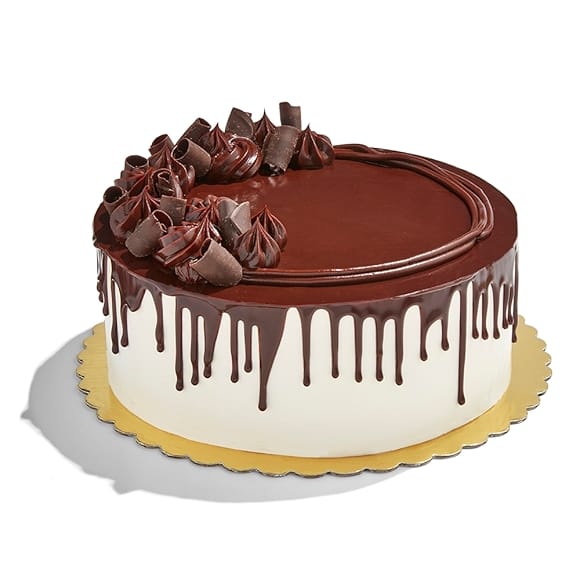 Whole Foods Market bakery custom cakes display featuring seasonal and celebration options