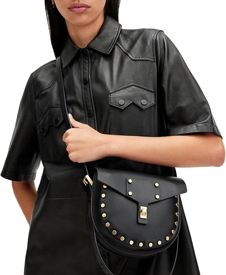 AllSaints Miro mini saddle bag in black leather with signature minimalist rocker-chic hardware detail