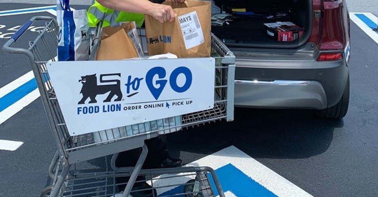 Food Lion To-Go curbside pickup service area with parking spot signage