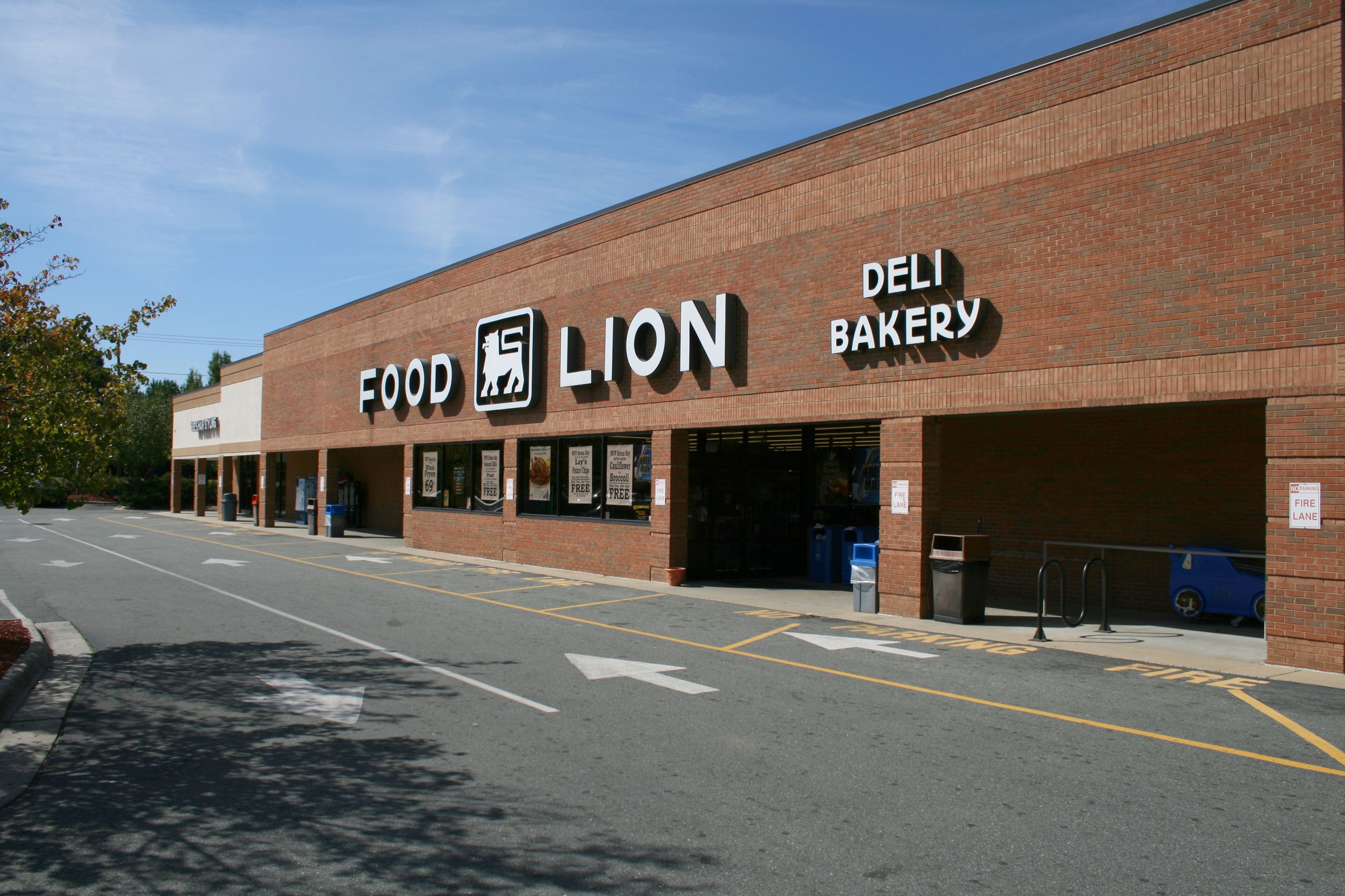 Food Lion grocery store exterior at University Center in Durham with parking lot