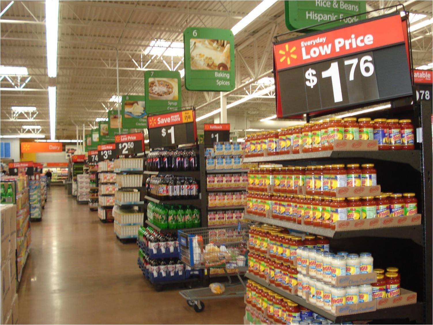 Walmart Supercenter grocery section aisle with shelves stocked with products