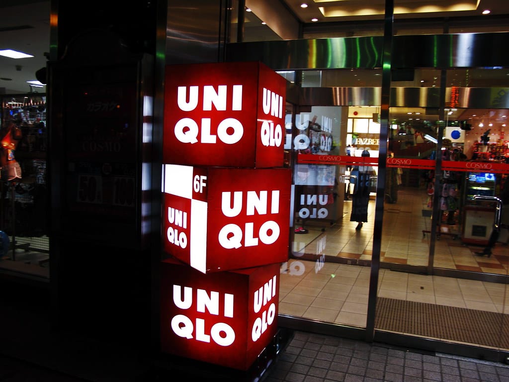 Uniqlo flagship storefront cube building known for high-quality Japanese basics apparel
