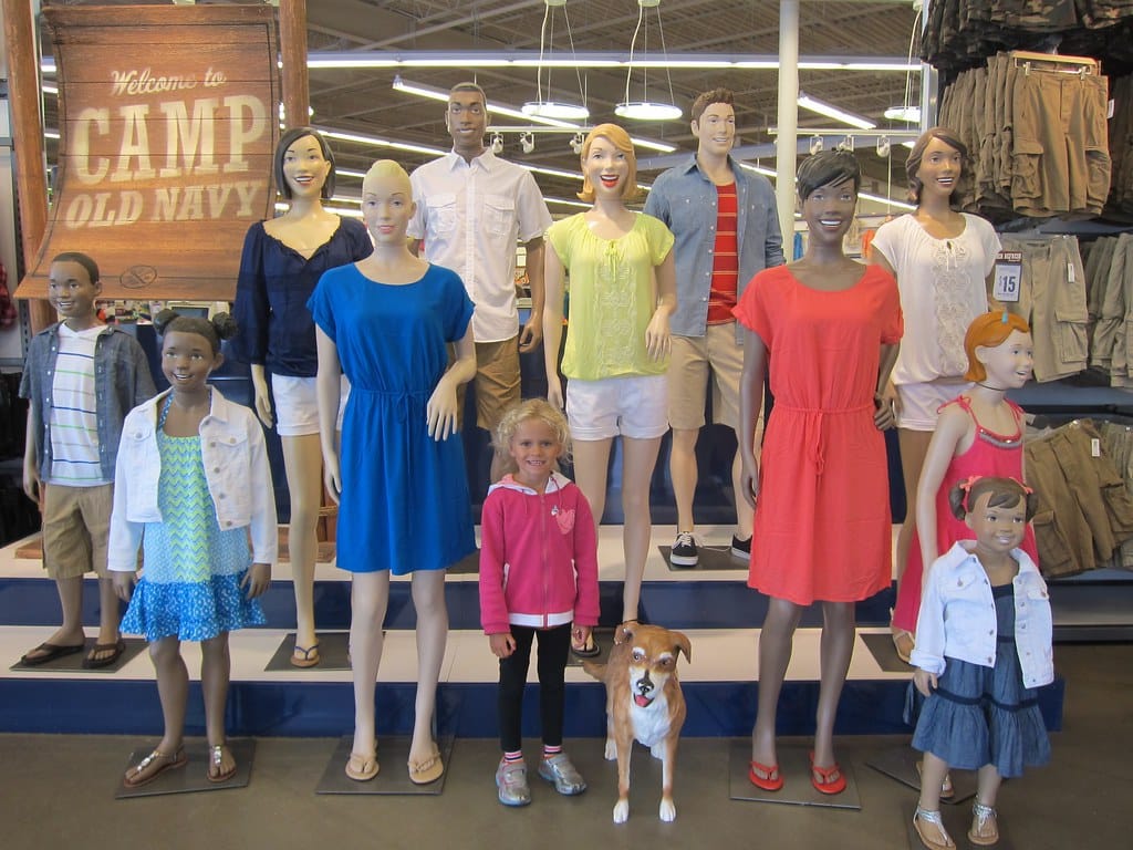 Old Navy retail store window display featuring family clothing at Maine shopping mall