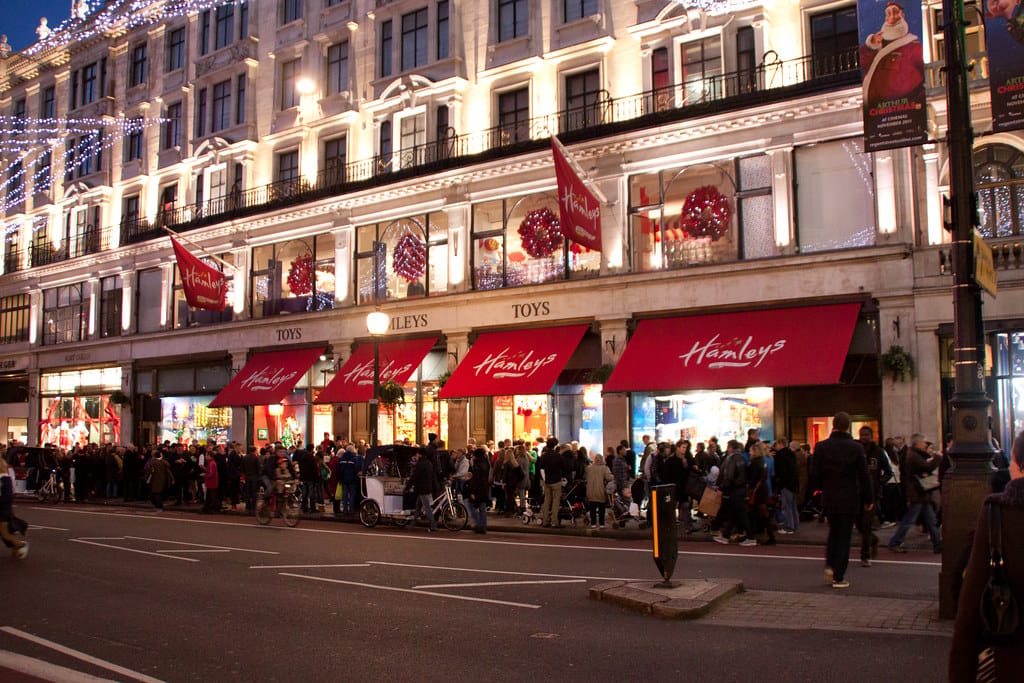 Crowds outside Hamleys toy store on Regent Street London during the Christmas shopping season